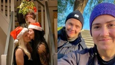 Kim and Nicole kissing under mistletoe and taking selfies together