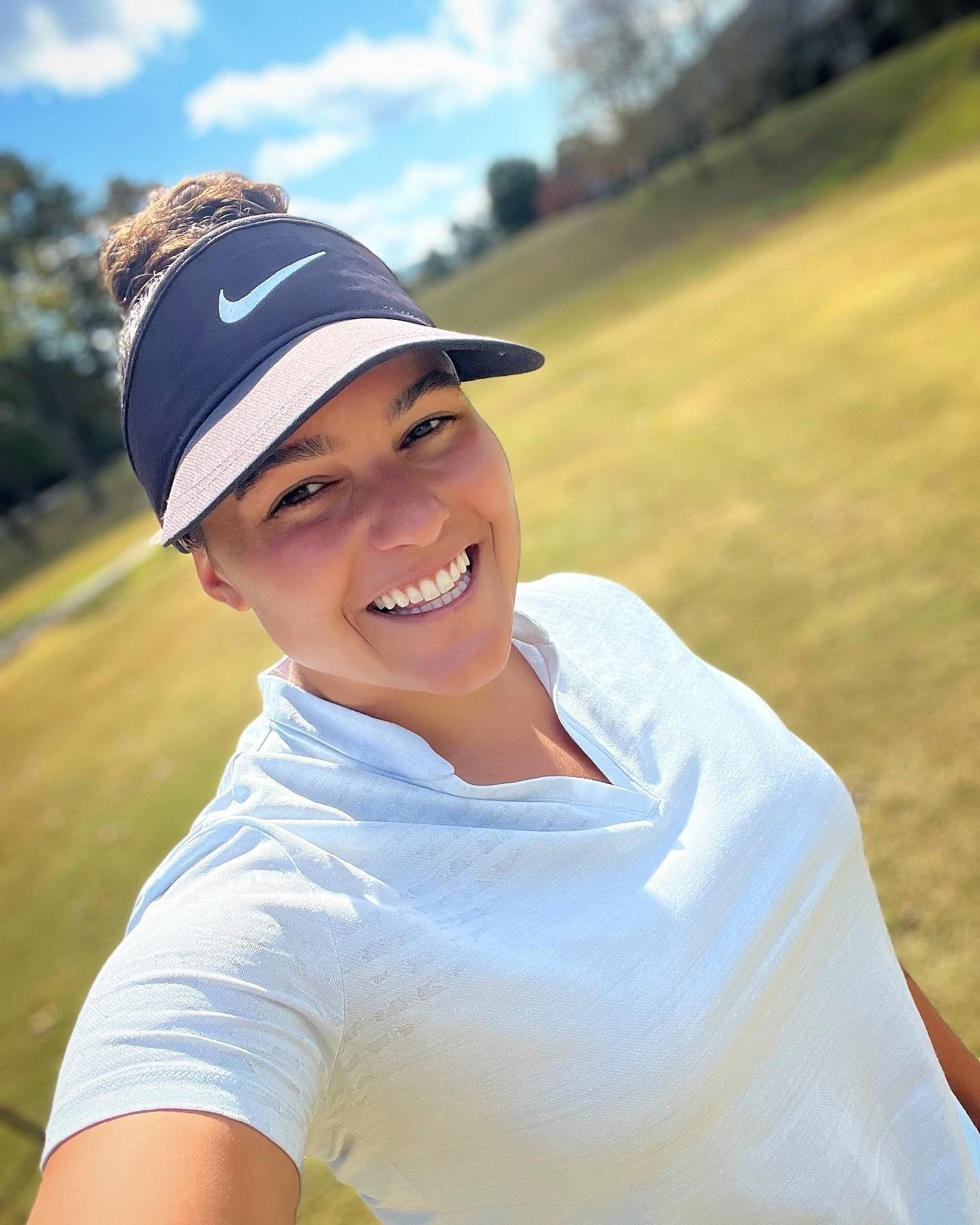 selfie of Natalie Sheary on the golf course