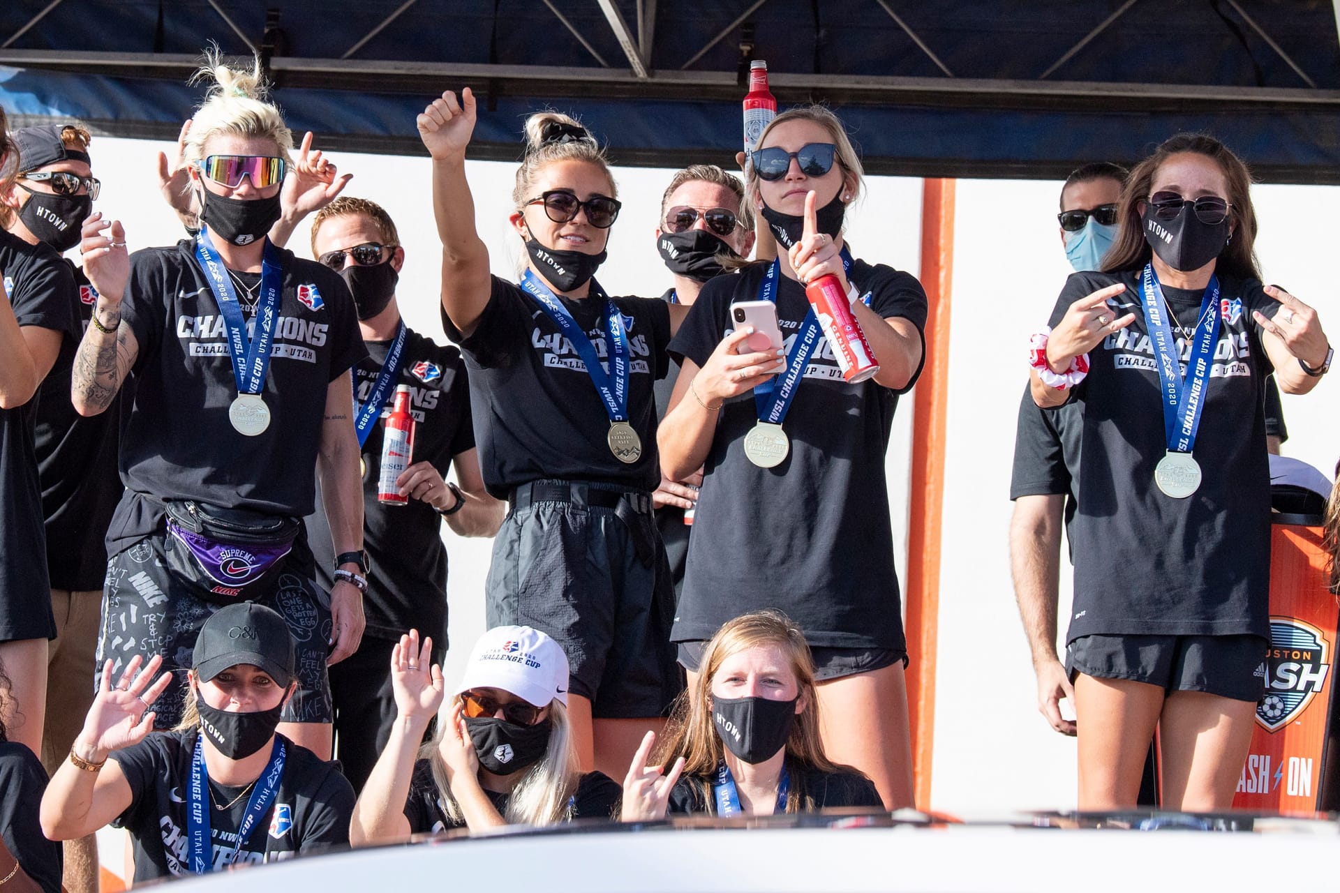 Houston Dash wave to fans during a Houston Dash Victory Drive-Thru Celebration after winning the 2020 NWSL Challenge Cup