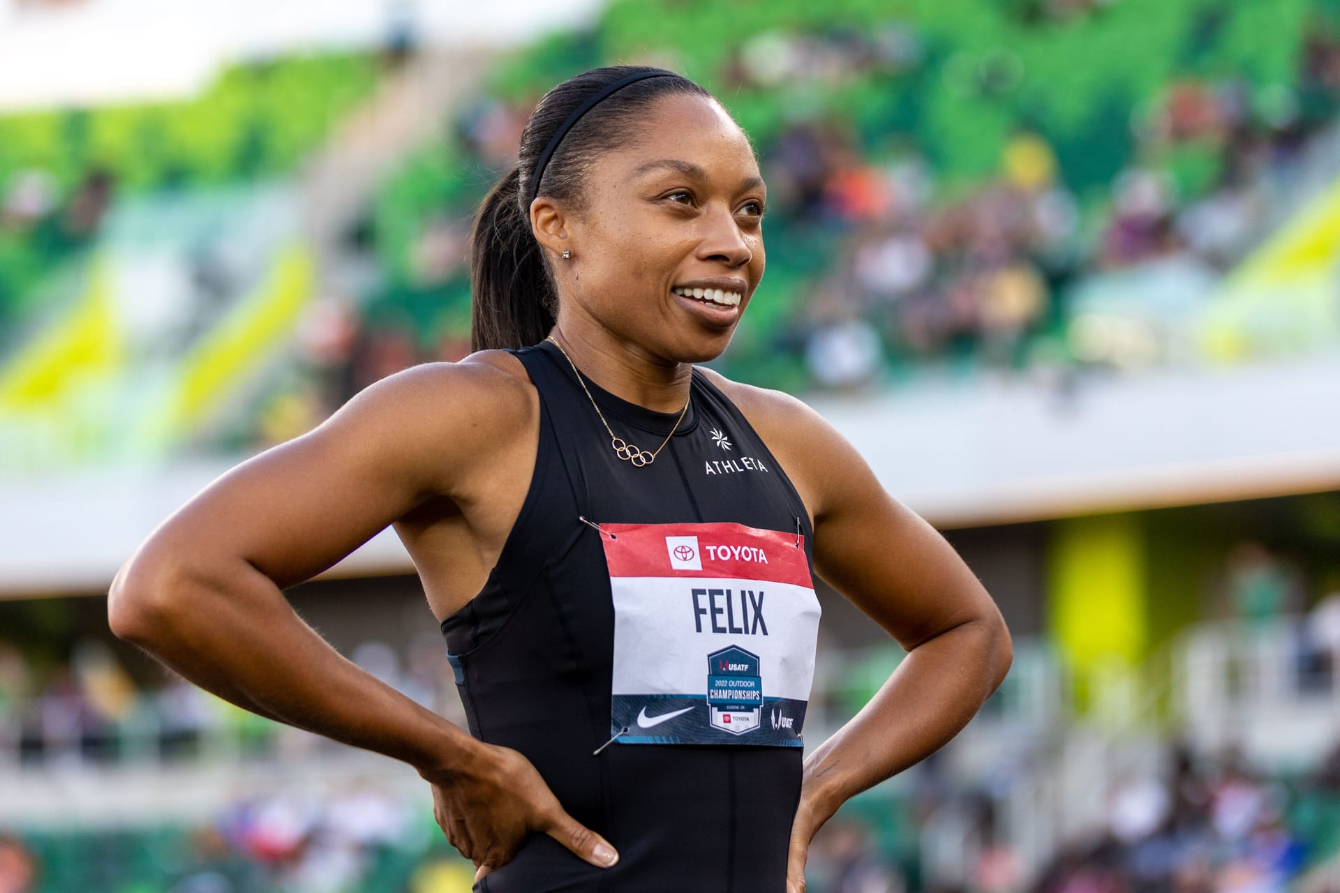 Allyson Felix smiling at a track & field event