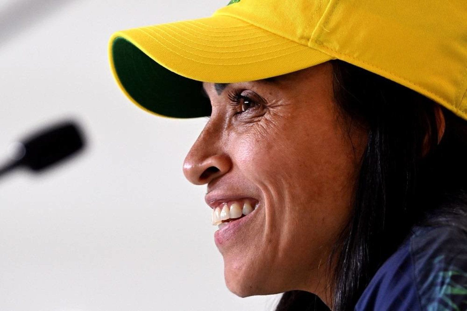 Marta smiles at a press conference