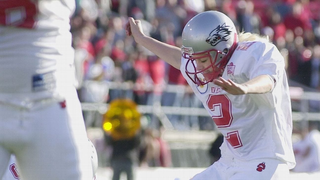 Katie Hnida playing on the field at a UNM football game