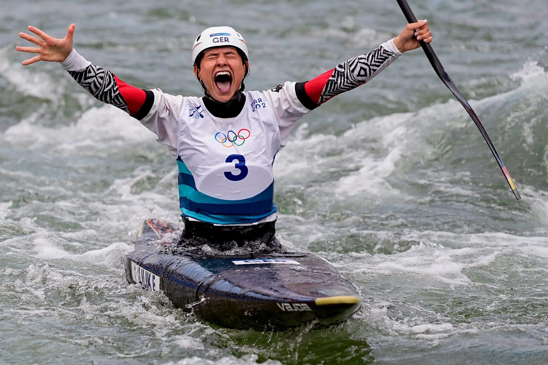 Jul 31, 2024; Vaires-sur-Marne, France; Elena Lilik of Team Germany celebrates the Canoe Slalom silver medal during the Paris 2024 Olympic Summer Games at Vaires-sur-Marne Nautical Stadium. Credit: © Sarah Phipps, Sarah Phipps / USA TODAY NETWORK via Imagn Images