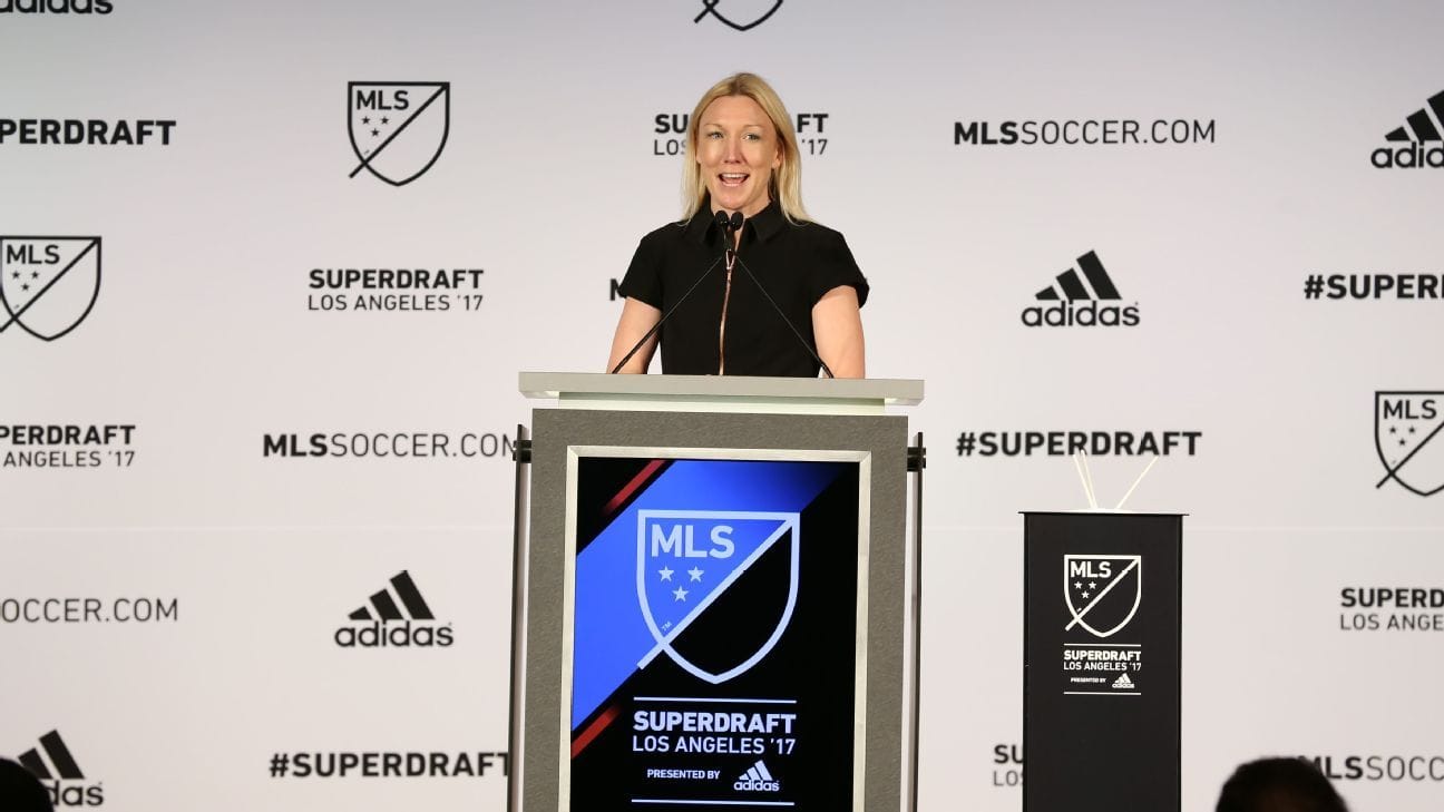 Amanda Vandervort speaking from podium at MLS press conference