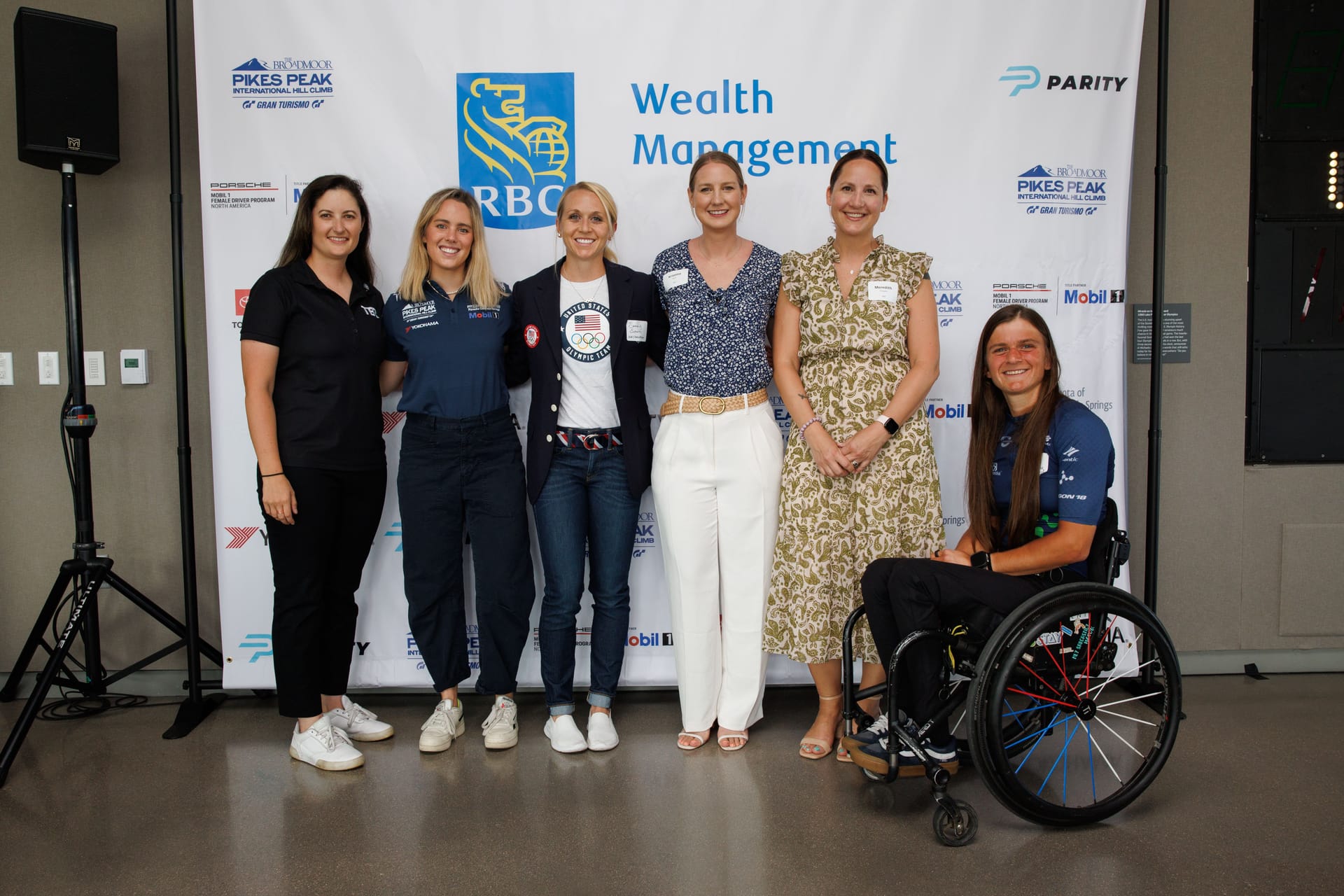 Group photo of Sammy Schultz and other athletes at Pike's Peak event