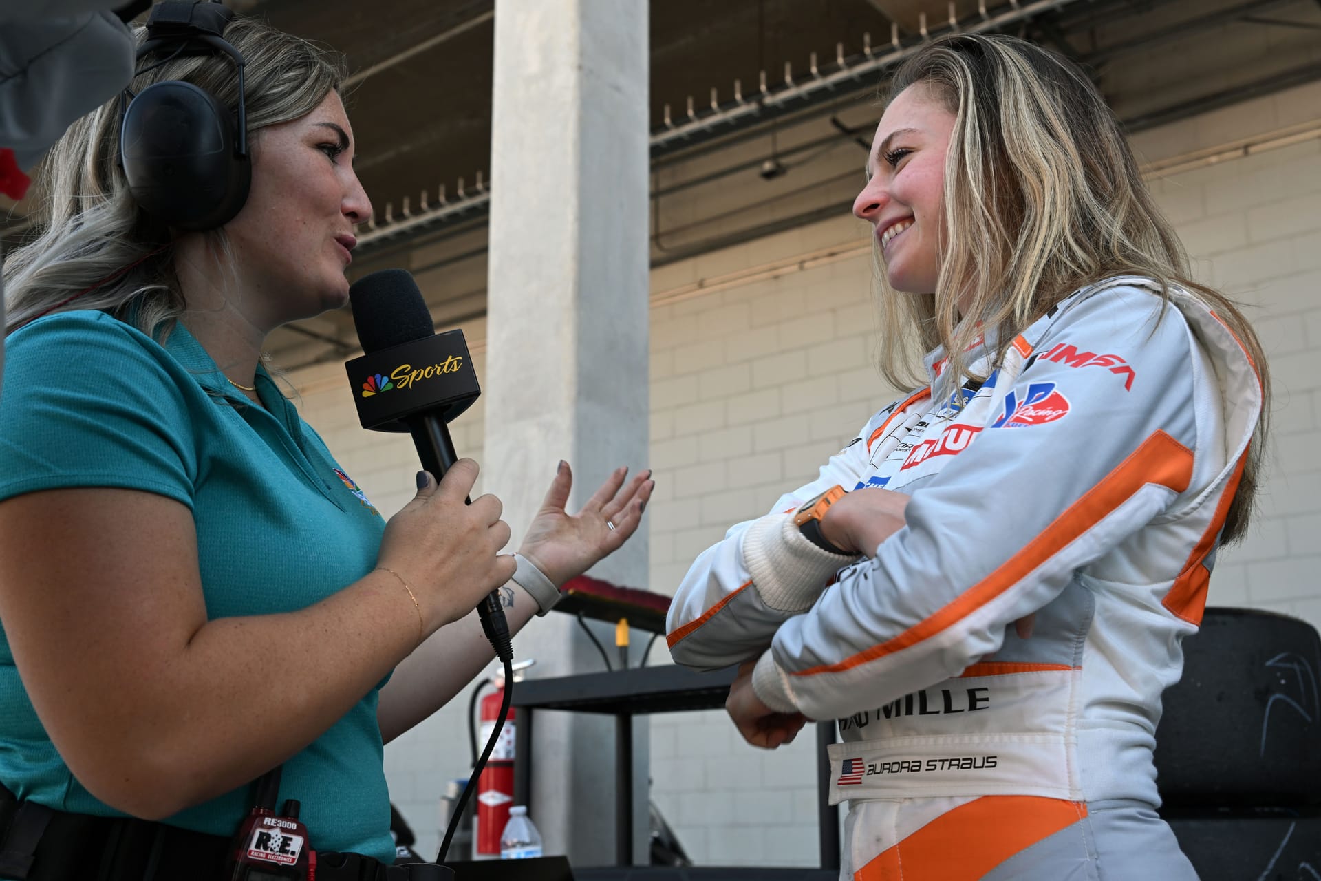 Aurora Straus being interviewed at the track