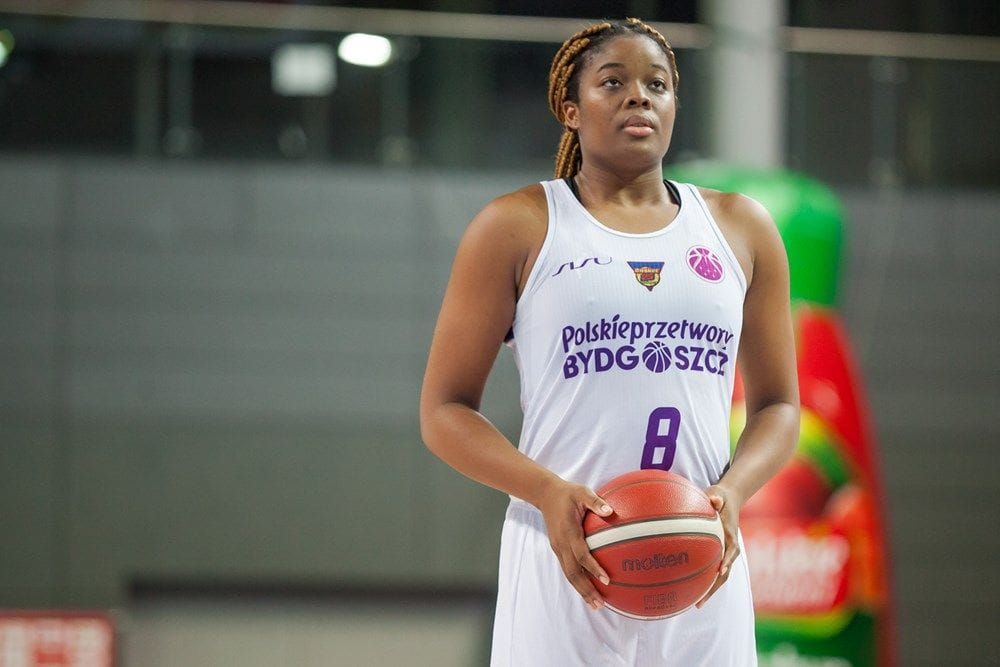 Jillian playing basketball in Poland