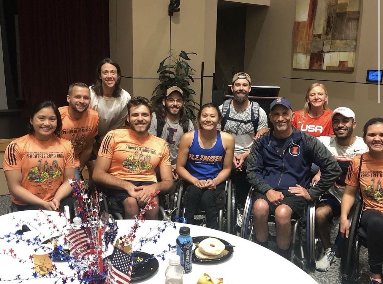 Hannah at a celebratory dinner with other Paralympians