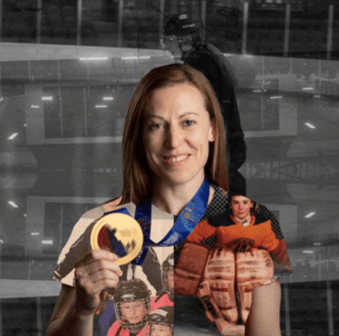 Jayne Hefford holding up a gold medal