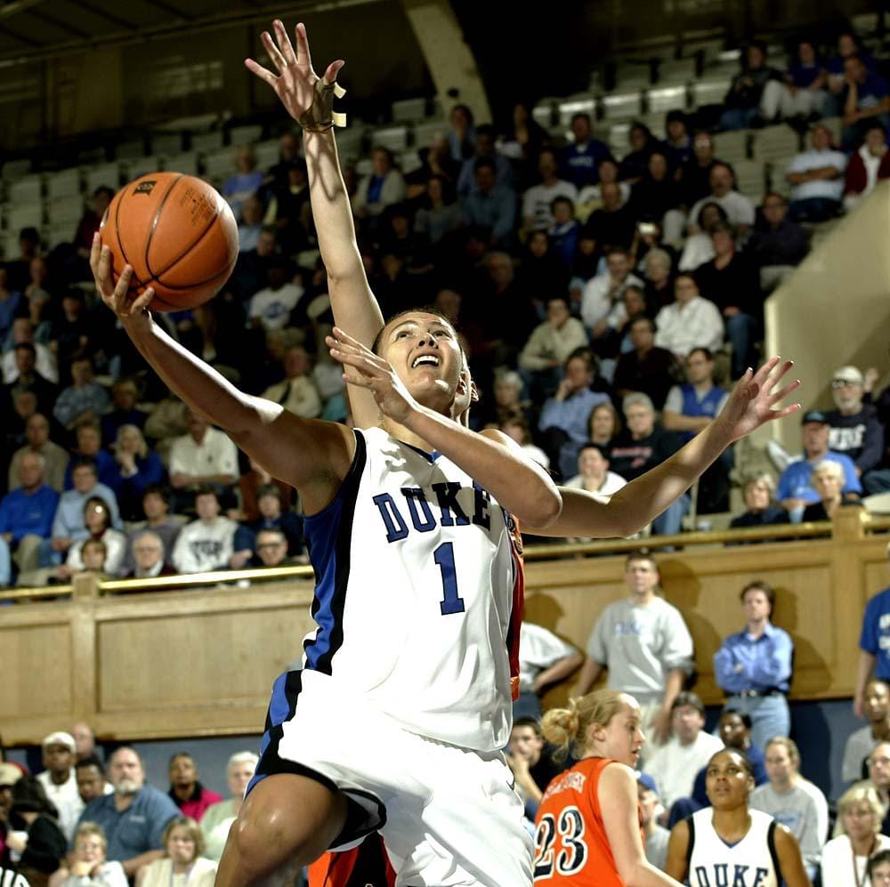Mistie playing basketball at Duke